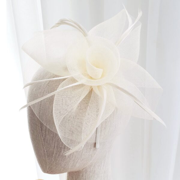 White cream toned floral fascinator.